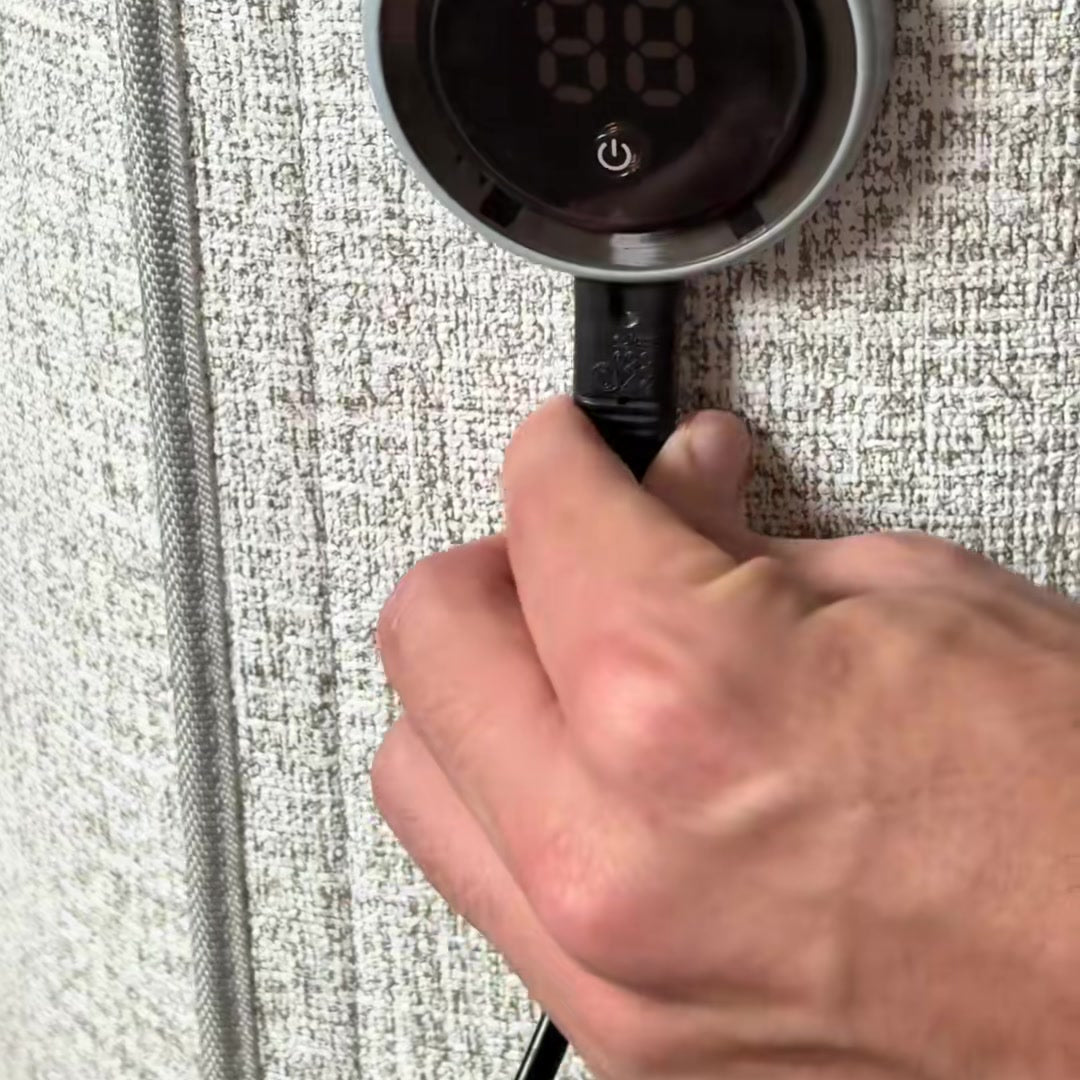 VarmeFold being switched on using the round control panel