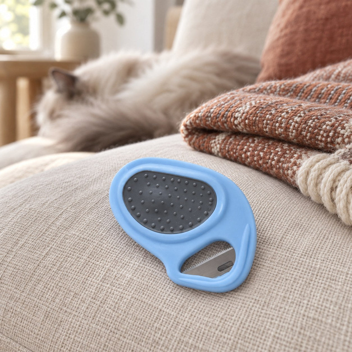 Hårknutefjerner for katt på sofaen
