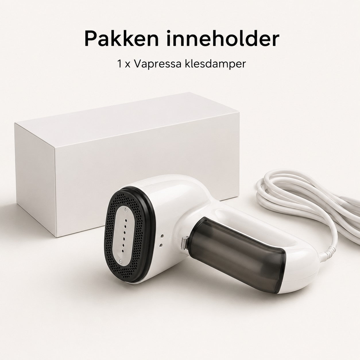 Vapressa pakken inneholder klesdamper strømledning og eske