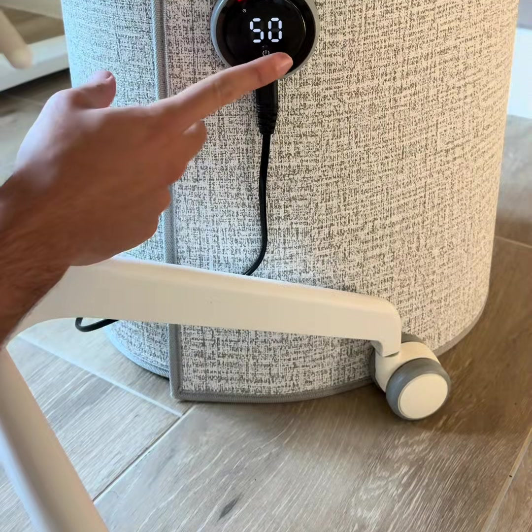 Close-up of the round control panel with display and power cord